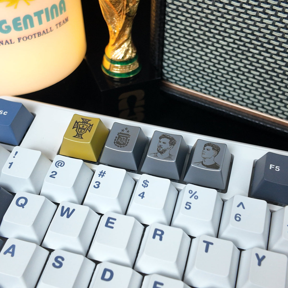 Football player portrait artisan keycap featuring engraved monochrome design on mechanical keyboard keycap